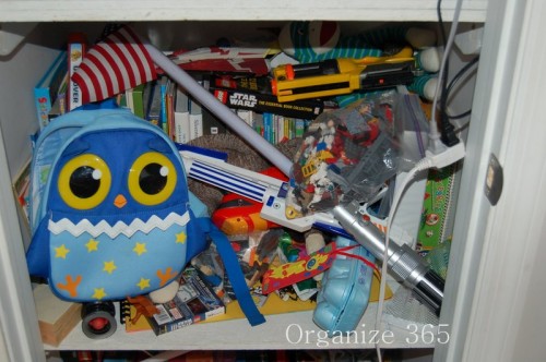 toy closet under the stairs